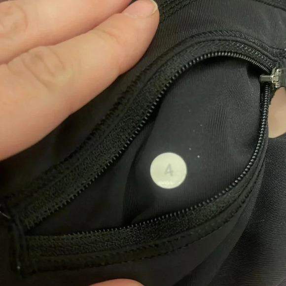 Lululemon athletica size 4 black crop leggings side zip pocket tulip hem capri - Picture 10 of 10